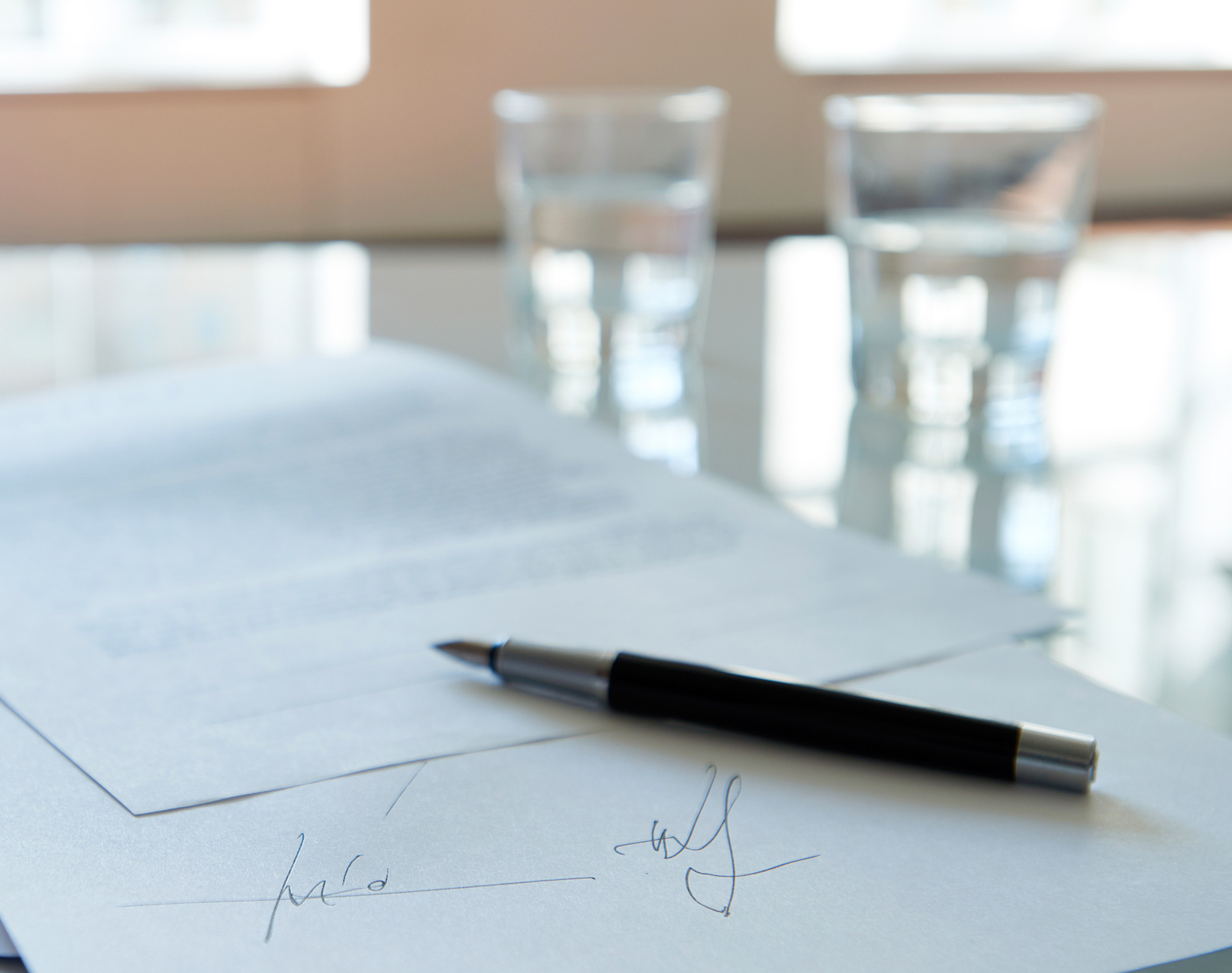 Signed document on table